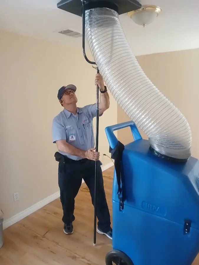 HVAC Installation technician using HEPA equipment in Clay